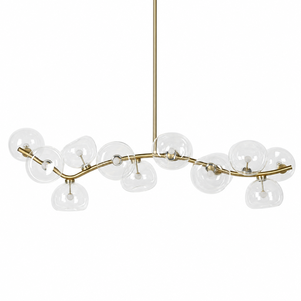 Clear glass 13-light linear chandelier in Natural Brass on a white background