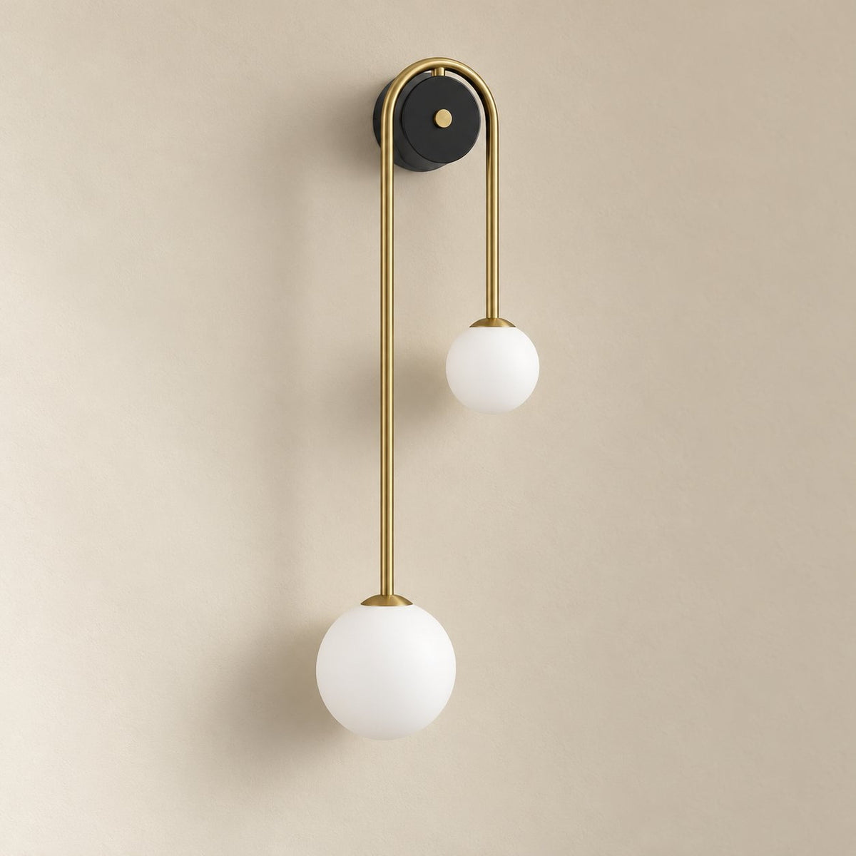 Alcoutim arc offset wall sconce, Left, 56 cm, unlit on a plain plaster wall.