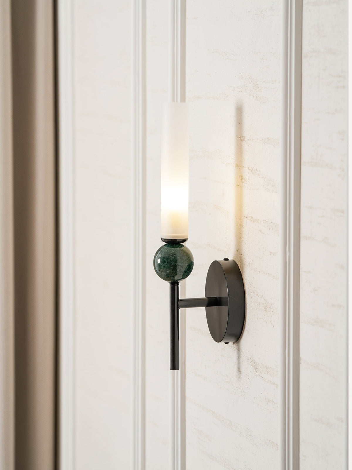 Aljezur wall sconce brass arm elegantly curved from base