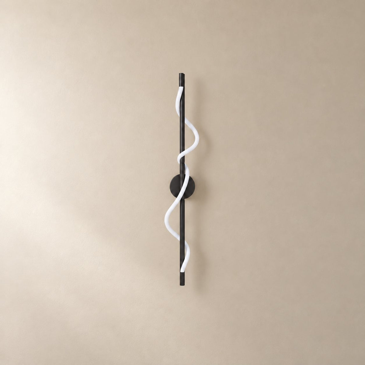 Alvito linear flexible wall sconce in matte black, 90 cm, unlit on a plain plaster wall.