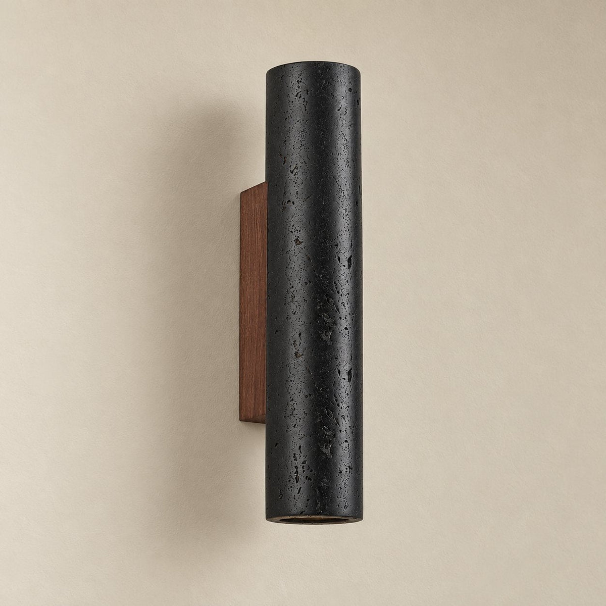 Arraiolos stone column sconce, 32 cm, unlit on a plain plaster wall.
