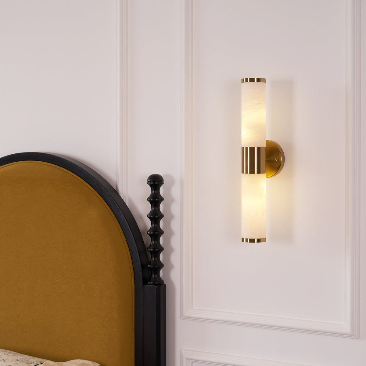 Beja wall sconce, brass mounting bracket detail