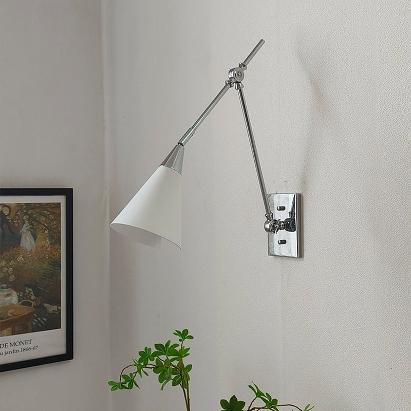 Bright nickel finish sconce in modern interior setting