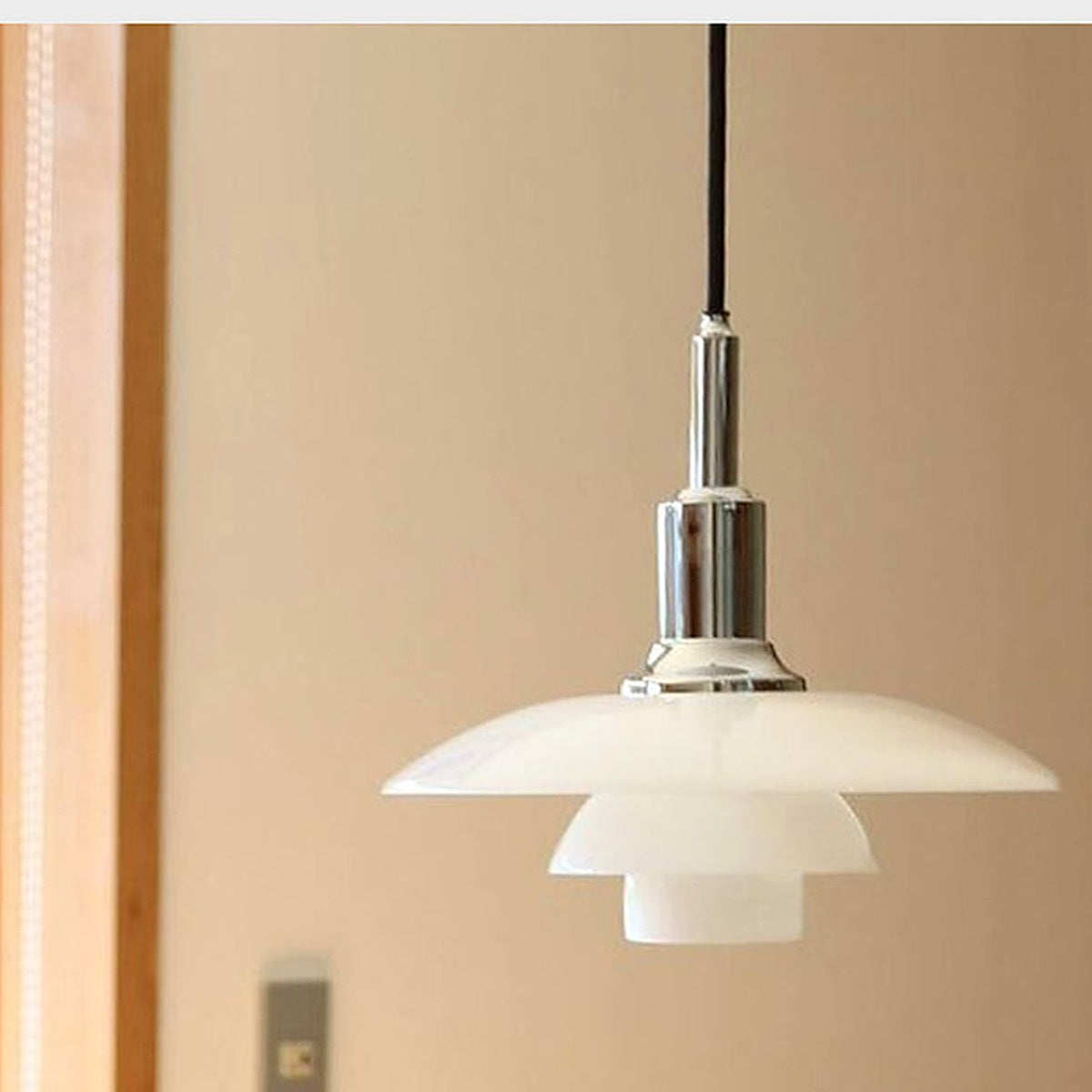 Three-Tier Opal Glass Pendant Light detail 01 opal glass and chrome hardware
