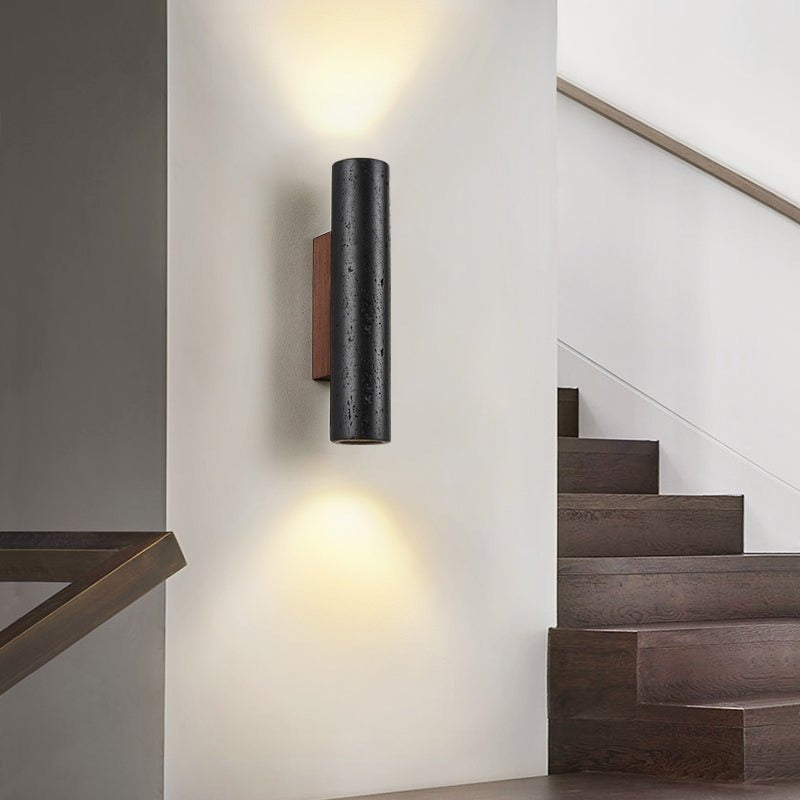 Downward light beam pattern cast on wall surface