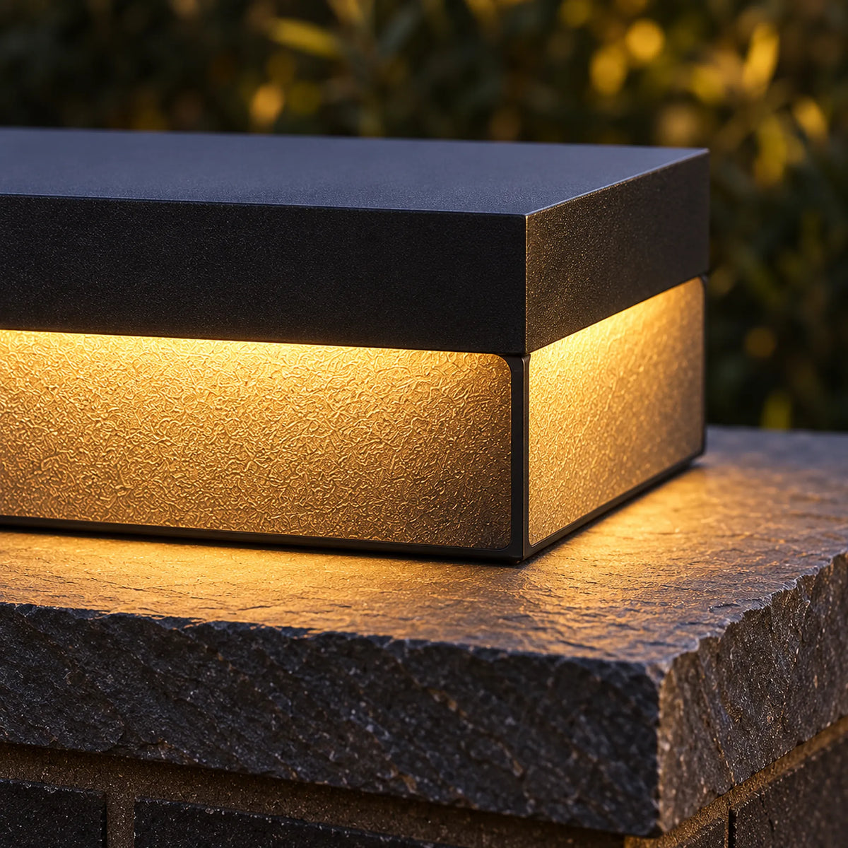 Heitz Plinthora close-up of the black body, illuminated acrylic corner and contact with the flat stone cap.