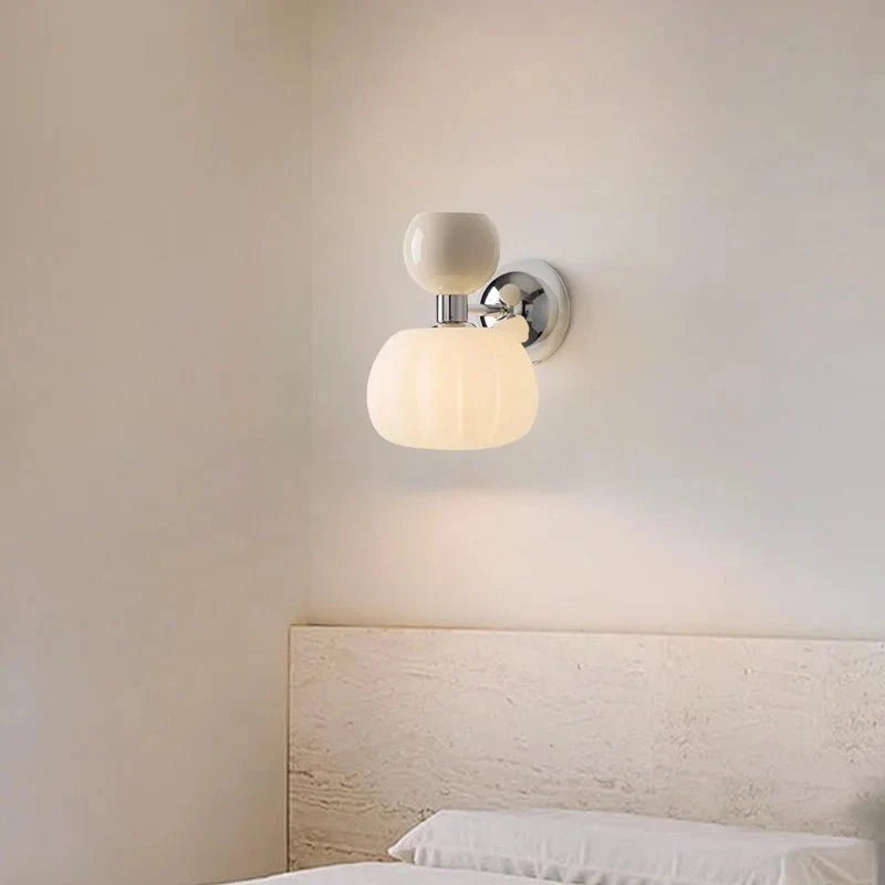 Isadora | Ribbed Pumpkin Wall Sconce in Moulded Resin and Iron - Luma House
