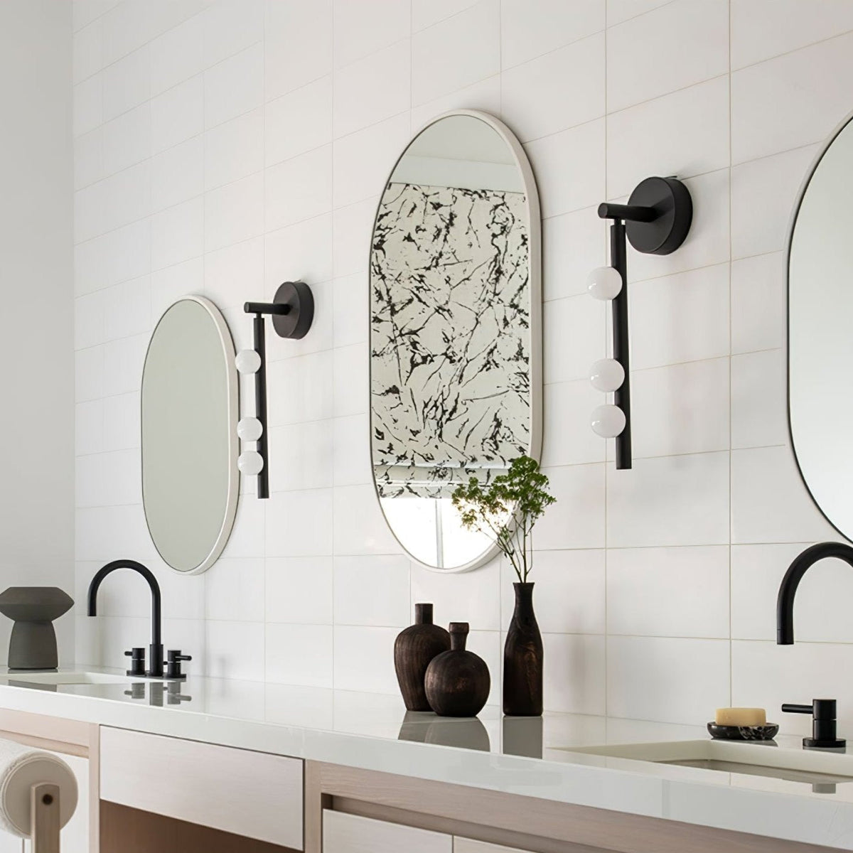 Lifestyle image of Vouga sconce mounted in dining room
