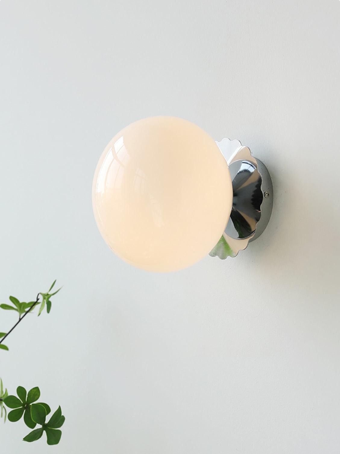 Lifestyle photo of Marshmallow sconce as wall-mounted accent light