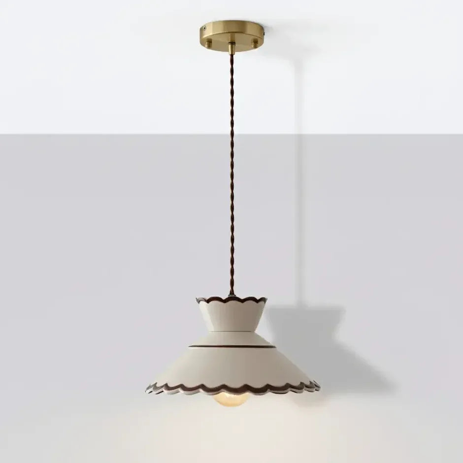 Mira scalloped ceramic pendant light showing its ceiling canopy and cord