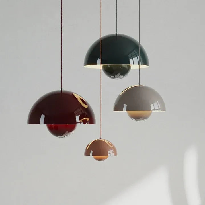 Nola mushroom pendant lights in deep green, red and neutral tones