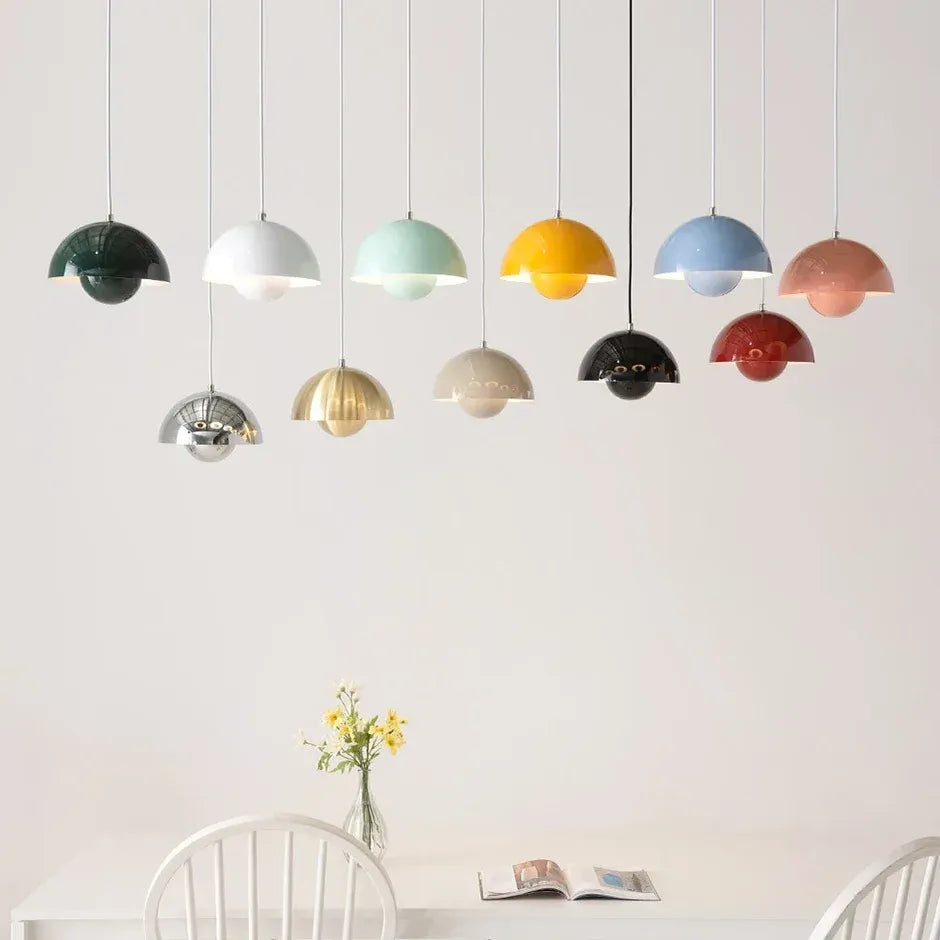 Nola colorful mushroom pendant lights arranged above a dining area