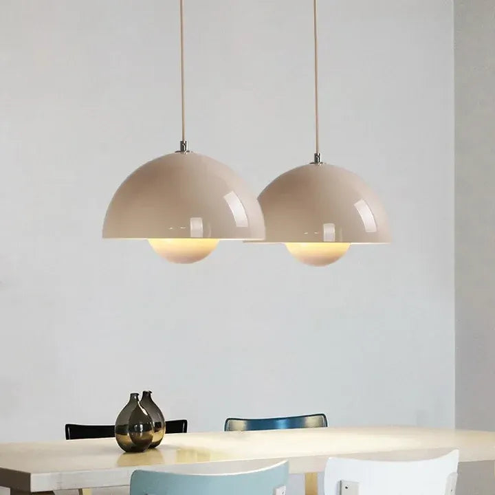 Two neutral toned Nola mushroom pendant lights above a dining counter