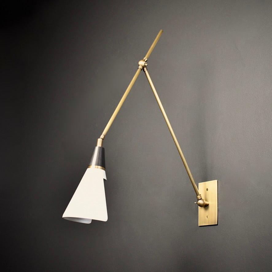 Office lighting with swivel-arm sconce overhead