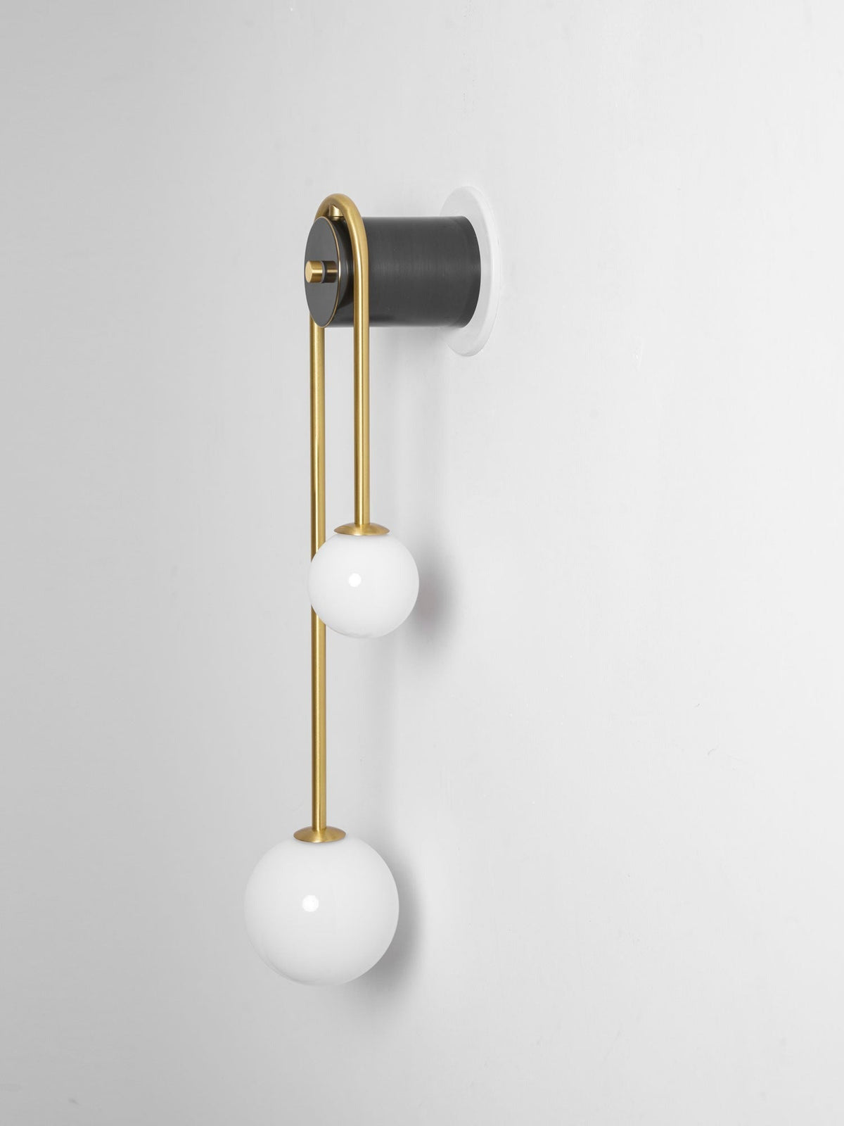 Offset shade composition detail on Alcoutim sconce
