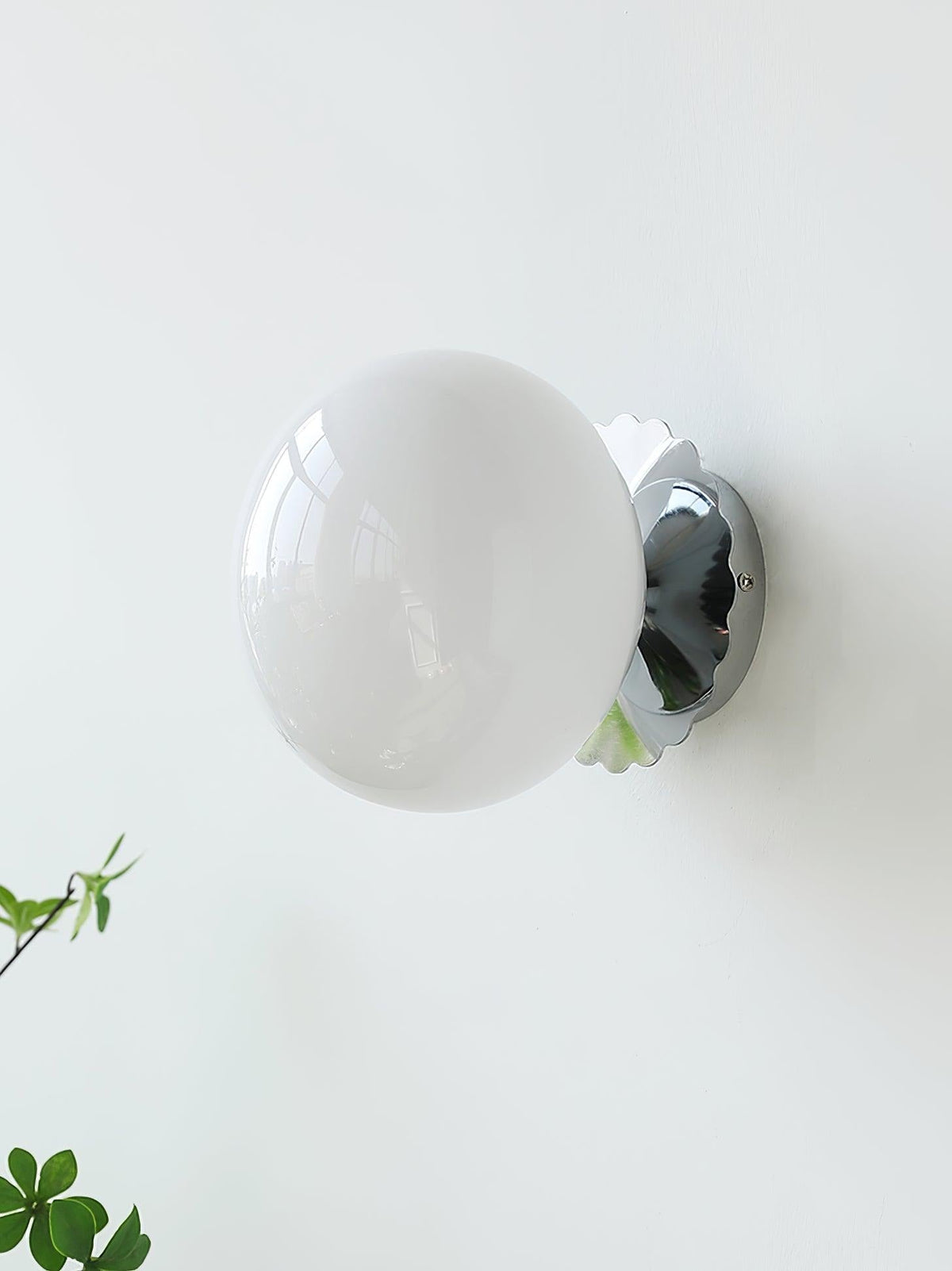 Product assembly photo of complete Marshmallow sconce