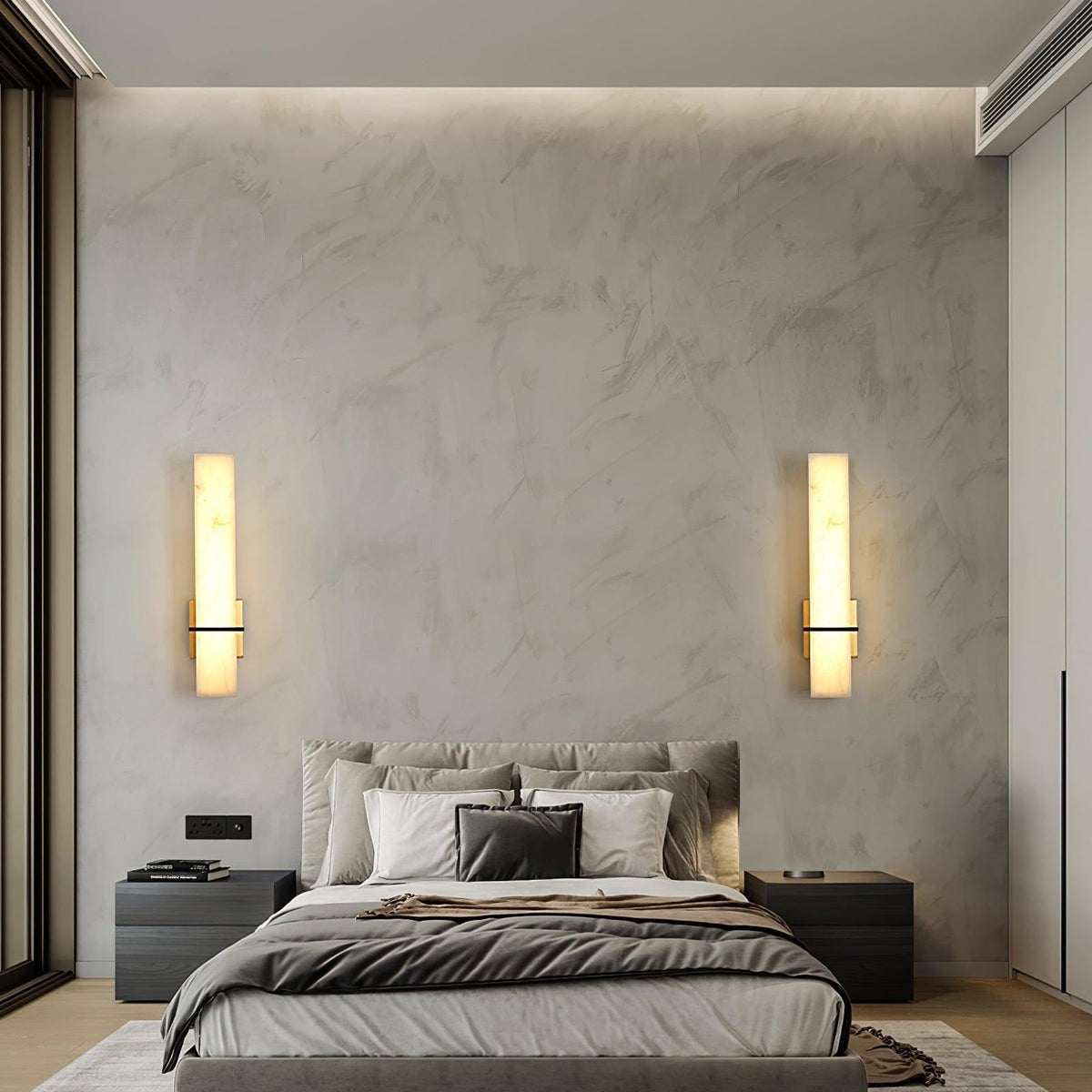 Sconce mounted at eye level in modern entryway