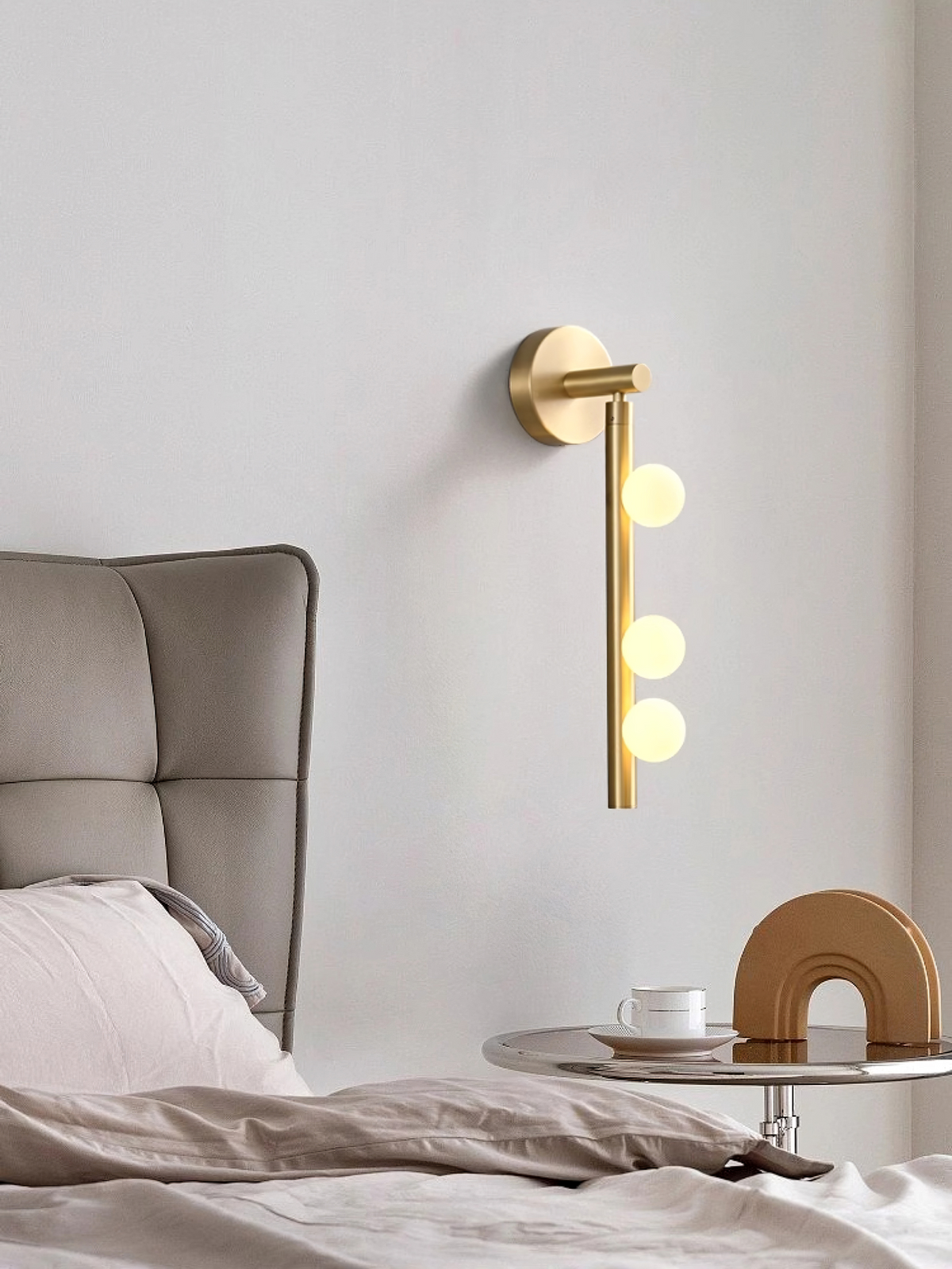 Studio shot of Vouga four-head sconce, horizontal orientation