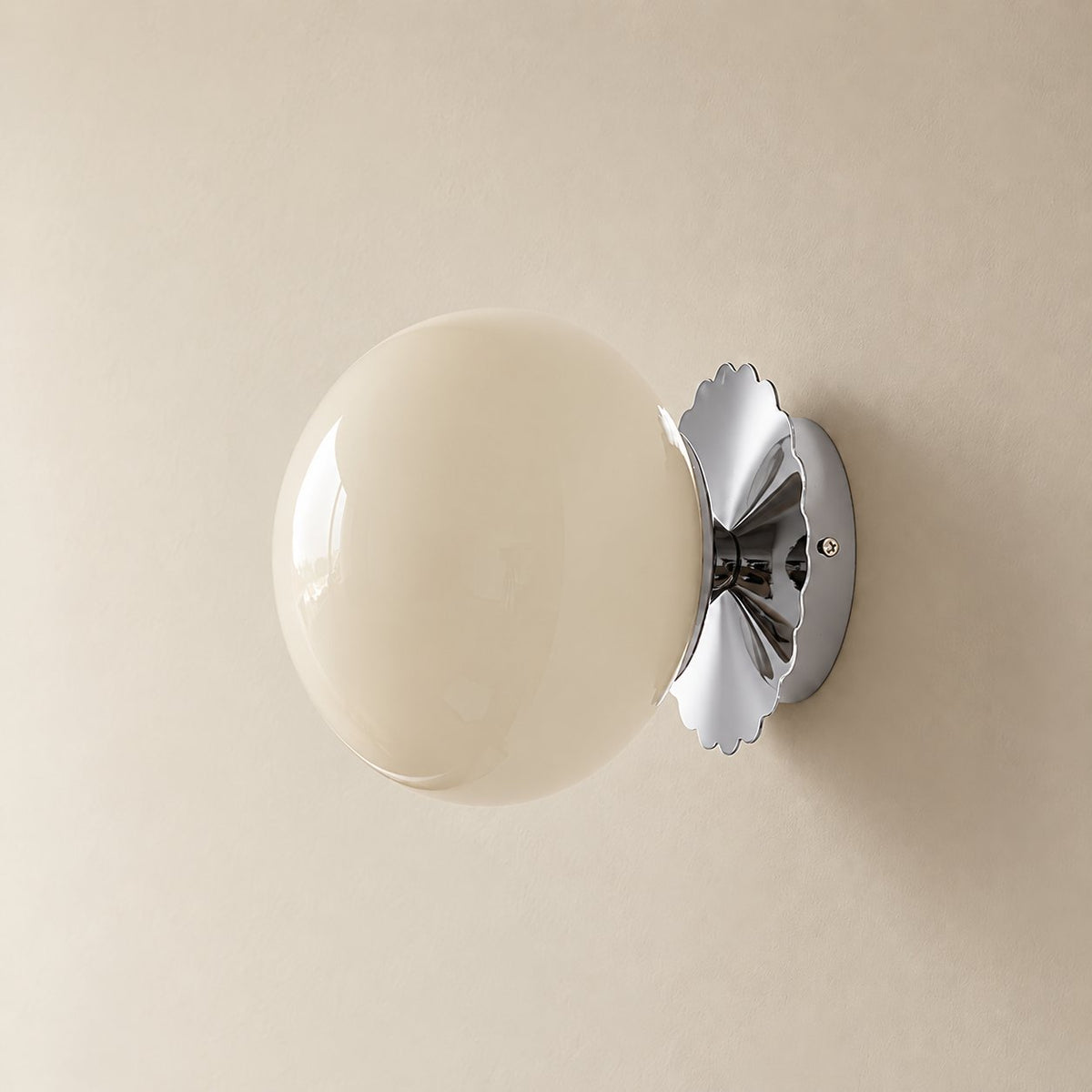 Tâmega convertible wall sconce in chrome and beige, unlit on a plain plaster wall.