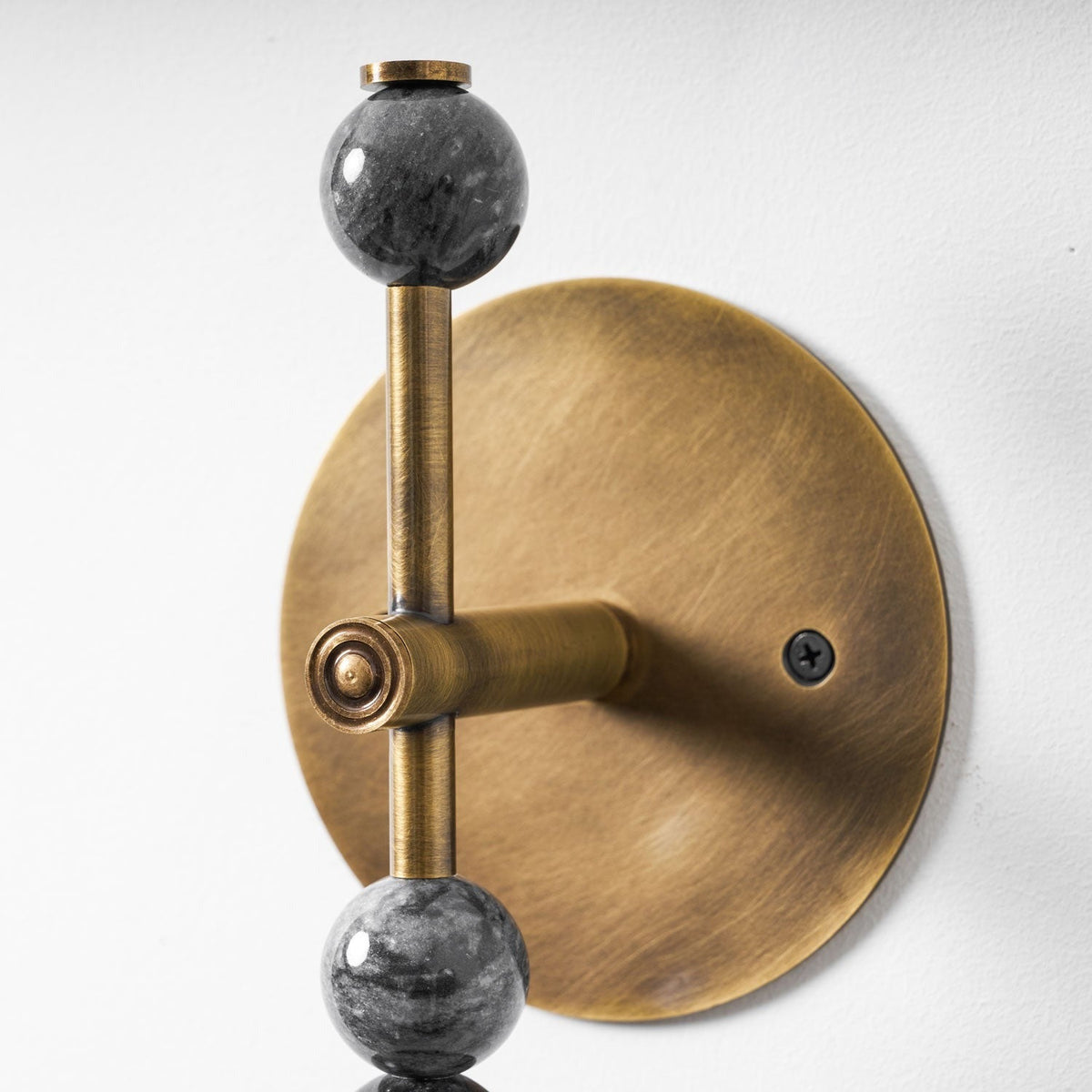 Torto marble and brass intersection detail