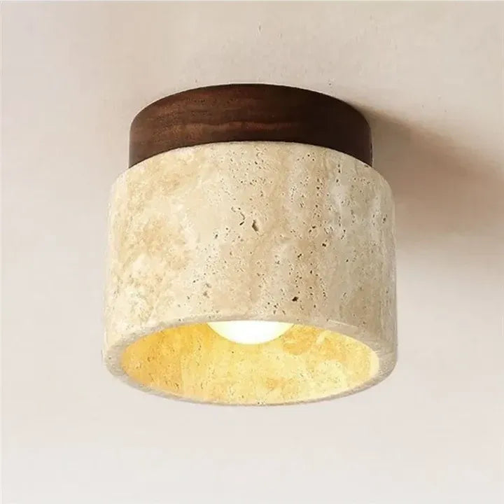 Tova travertine ceiling light showing the walnut finish canopy and stone shade