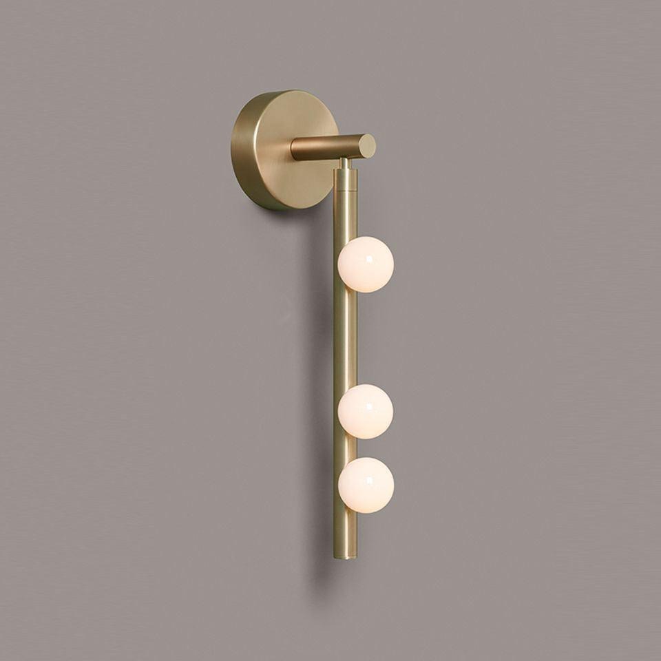 Vouga seven-A sconce mounted vertically on wall