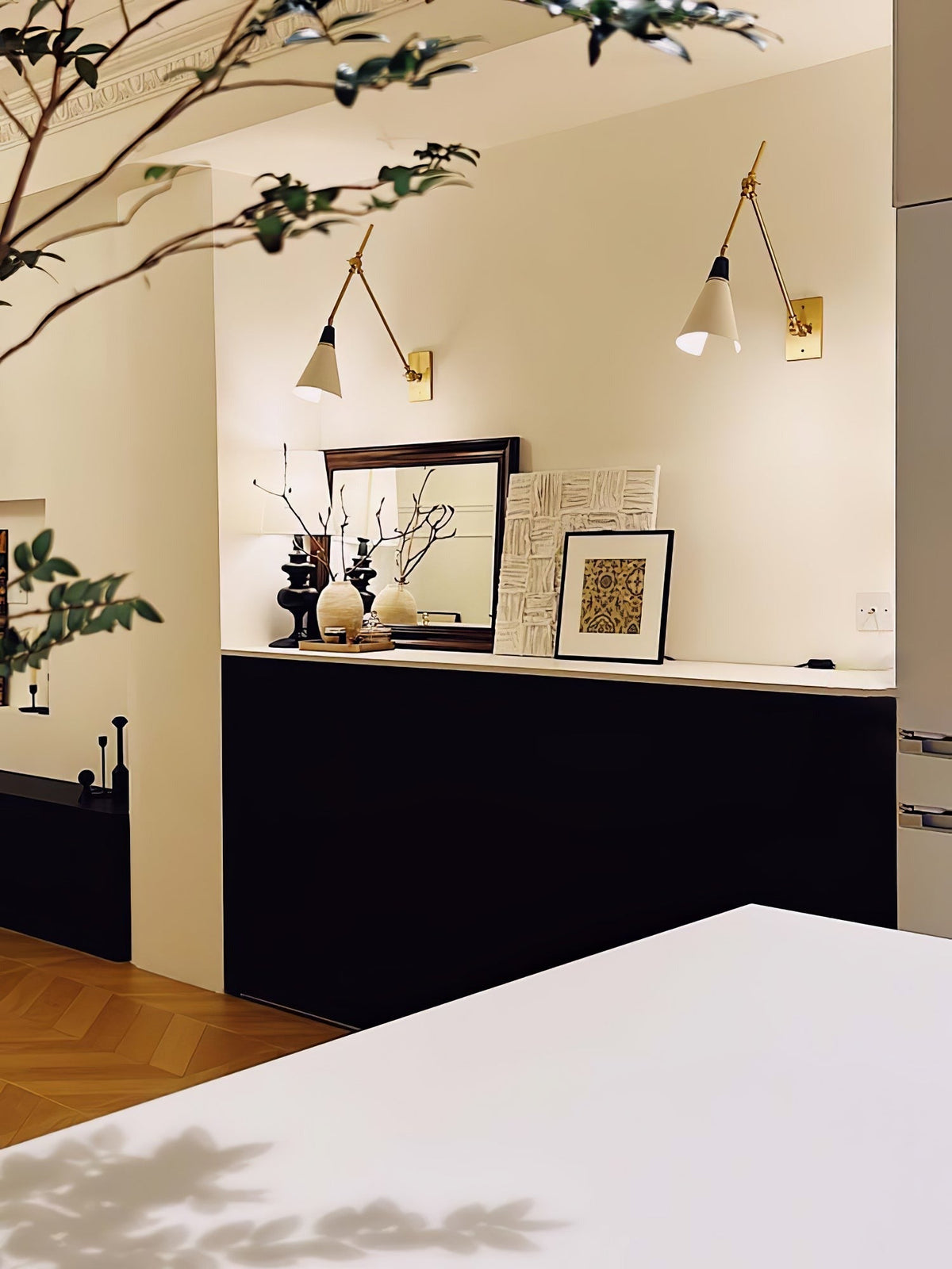 Wall-mounted sconce with full articulation of arm and shade
