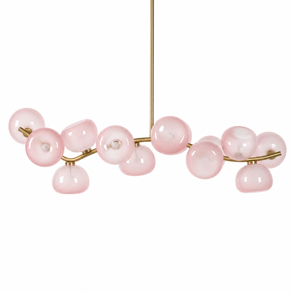Blush glass 13-light linear chandelier in Natural Brass on a white background
