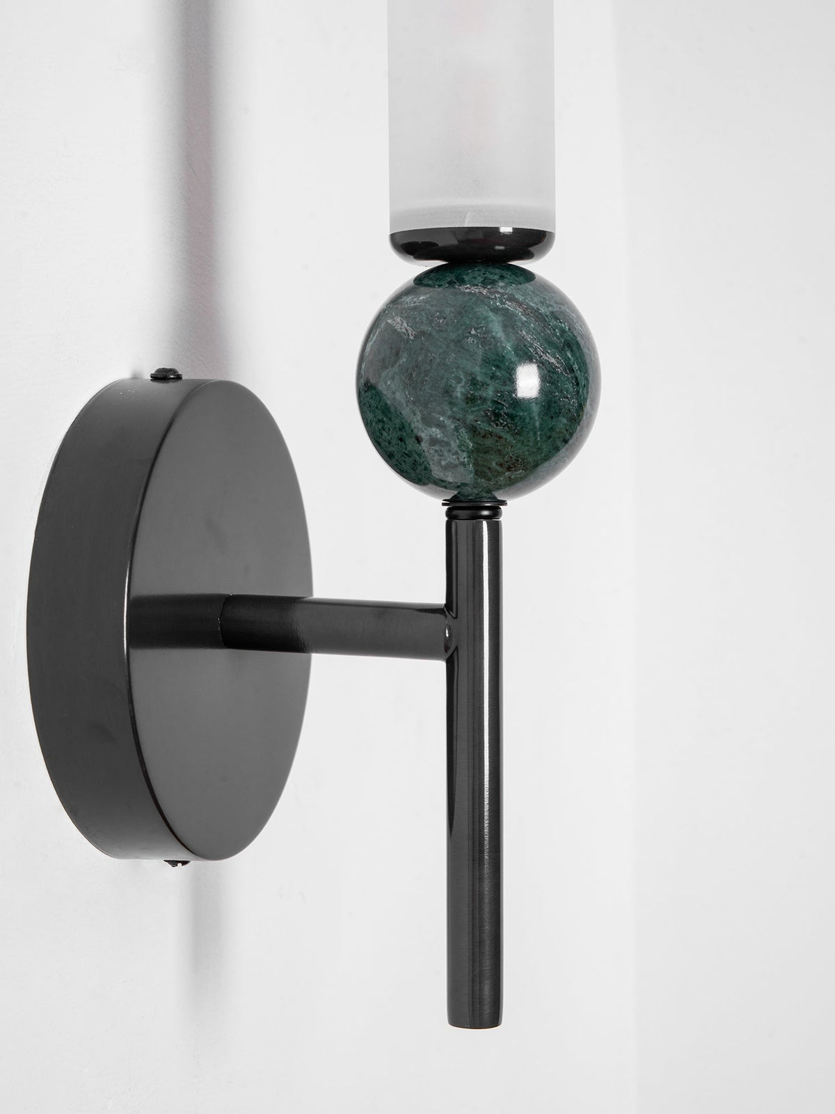 Aljezur wall sconce diffuser emitting soft warm light