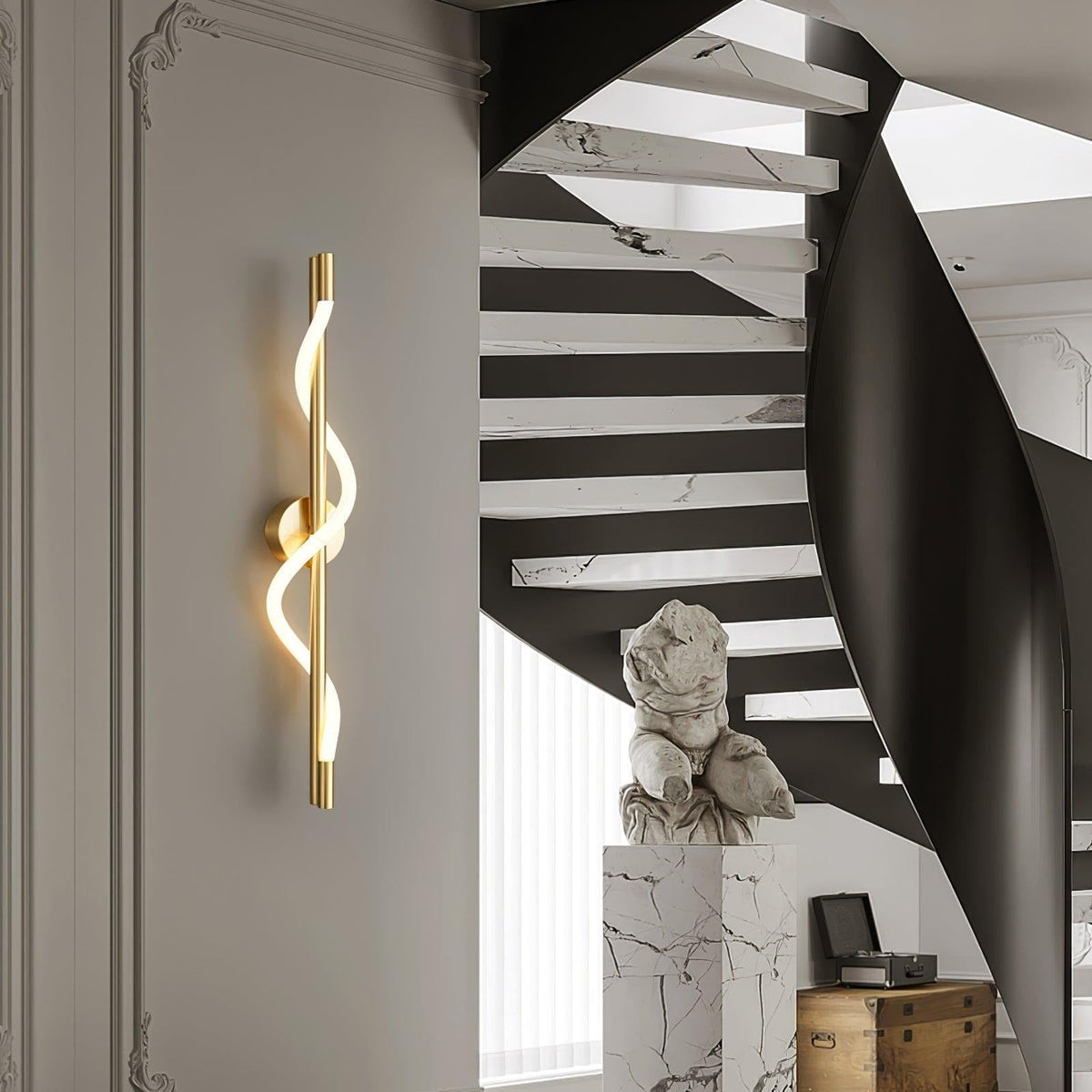 Alvito wall sconce brass finish on blue wall, showing light output and form