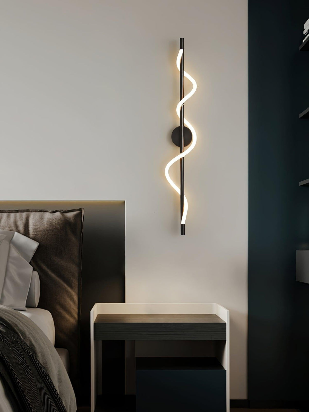 Alvito wall sconce on textured wall surface, warm glow and form