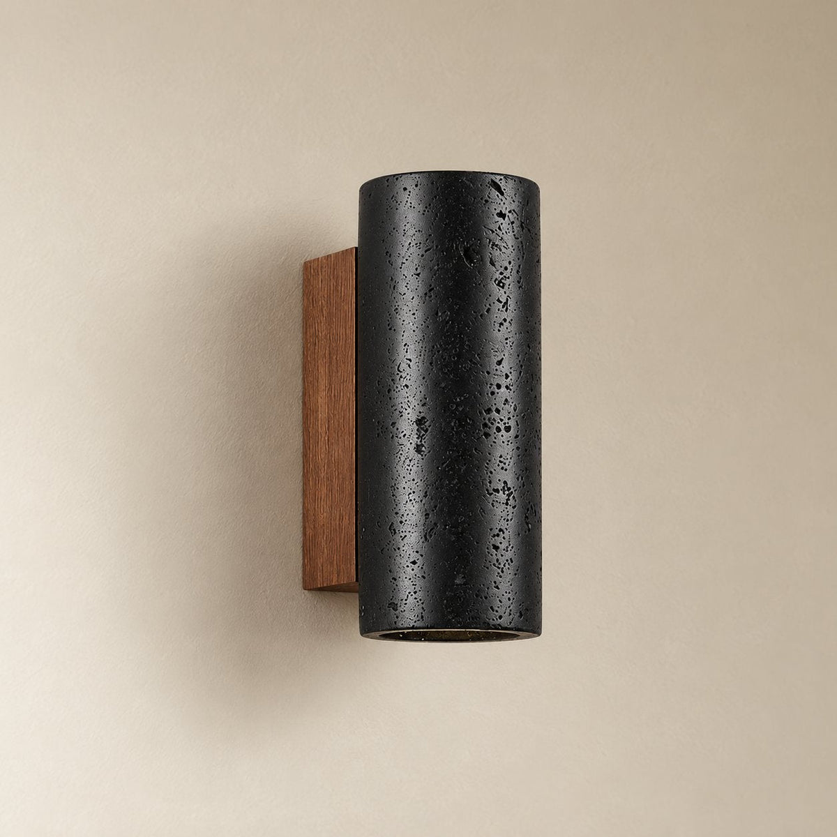 Arraiolos stone column sconce, 16 cm, unlit on a plain plaster wall.