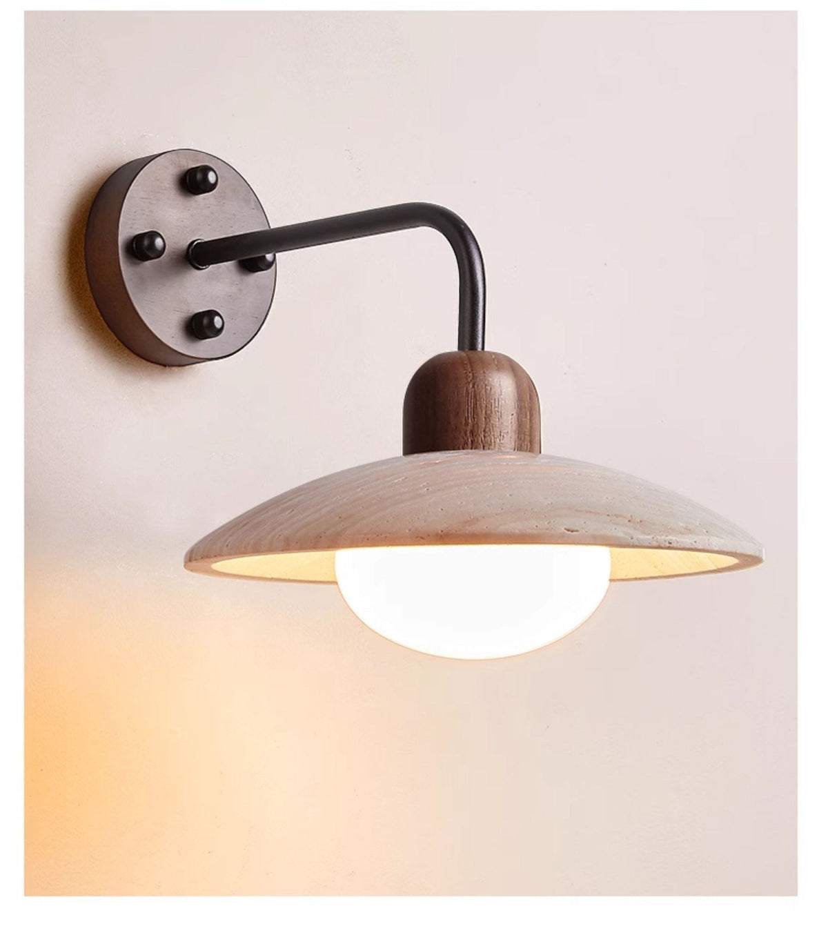 Boticas wall sconce in room setting showing light distribution