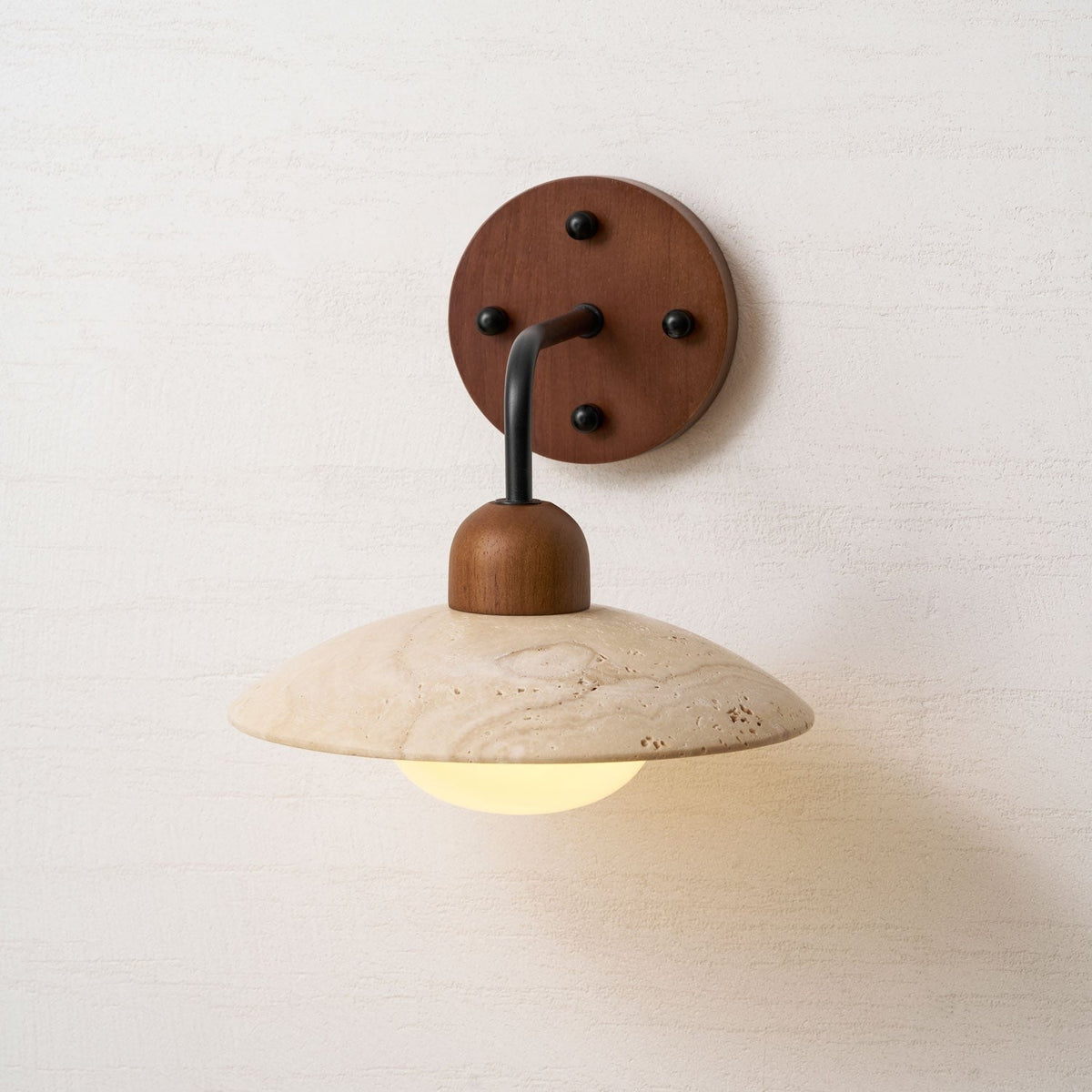 Boticas wall sconce installation showing standard switch compatibility