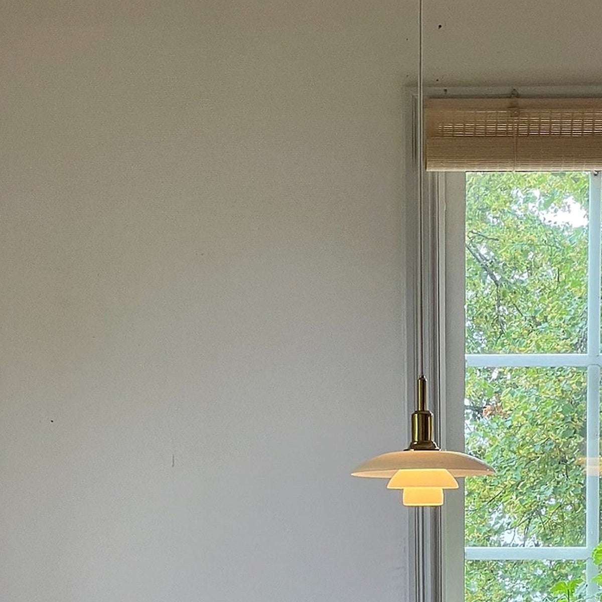 Three-Tier Opal Glass Pendant Light detail 03 layered glass and brass hardware