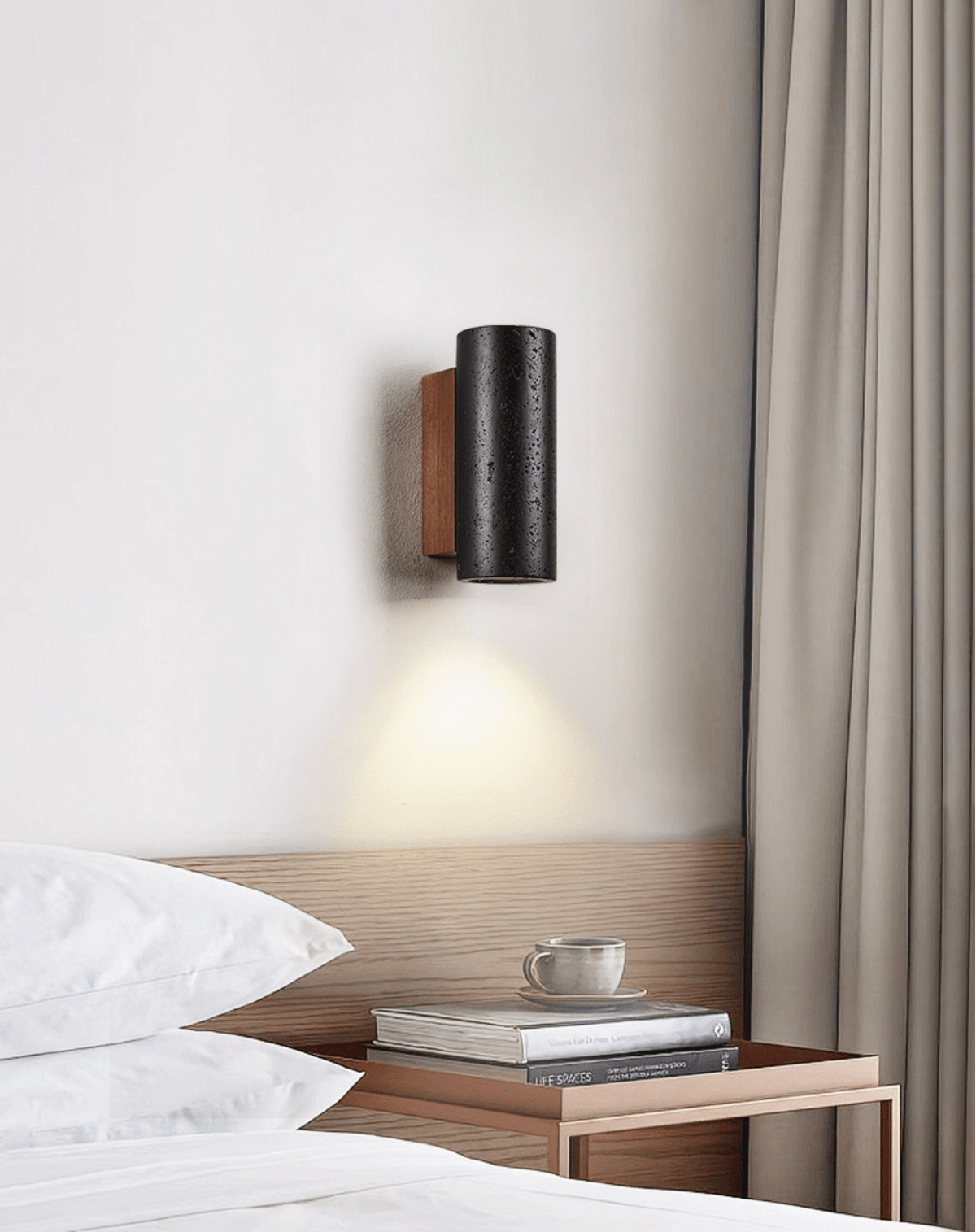 Front view of Arraiolos sconce with cylindrical travertine body