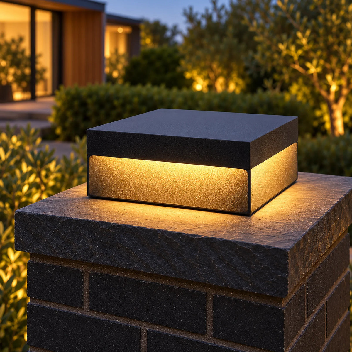 Heitz Plinthora Hardwired pillar light in an elevated view showing the plain black cap and acrylic band.