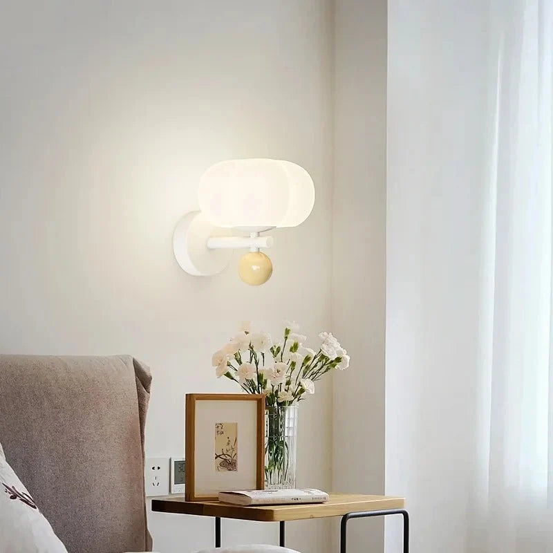 Isadora | Ribbed Pumpkin Wall Sconce in Moulded Resin and Iron - Luma House