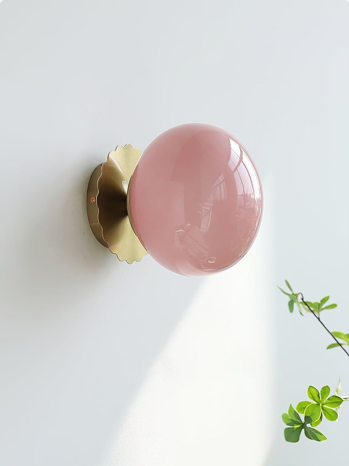 Marshmallow sconce chrome finish with pink tinted glass