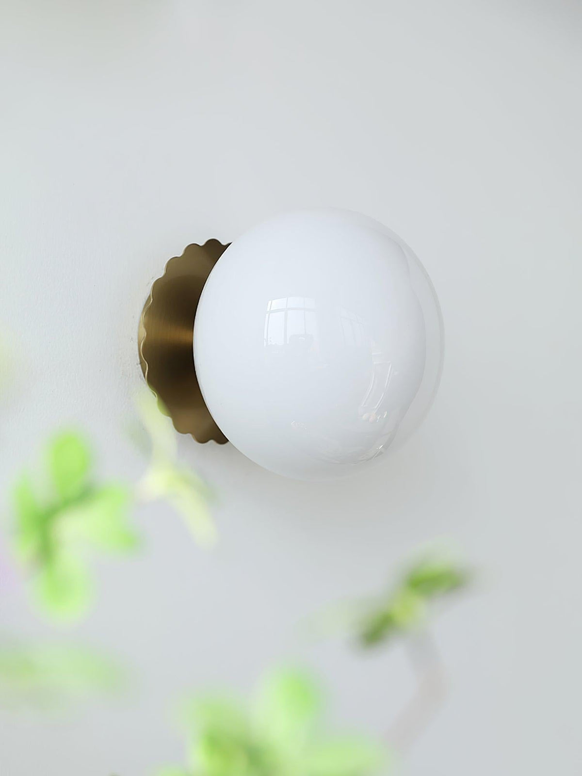 Marshmallow sconce size reference in room context