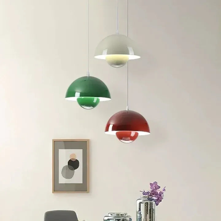 White, green and red Nola mushroom pendant lights arranged at different heights