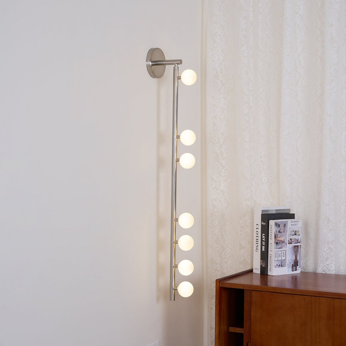 Overhead shot of Vouga six-head sconce mounted