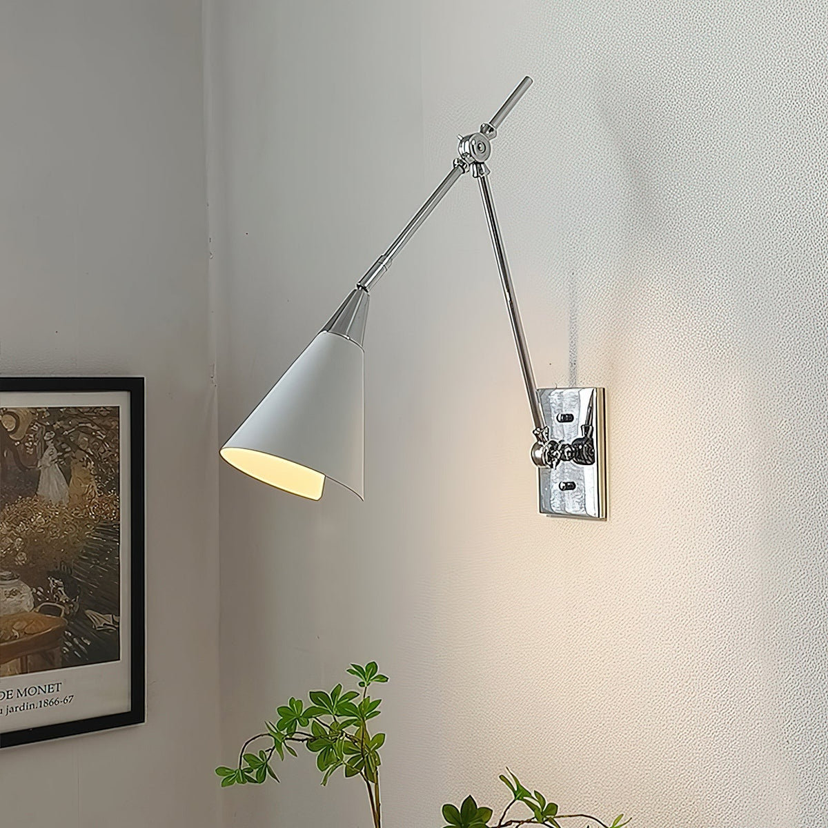 Petite sconce illuminated with warm light output