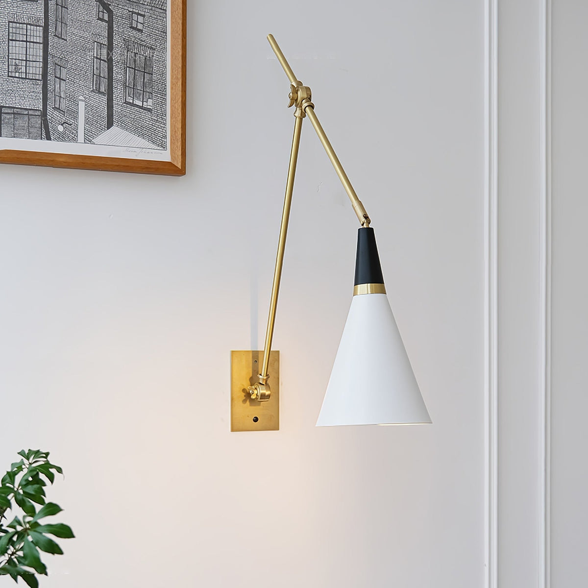 Sconce installed on wall in room setting with accent lighting
