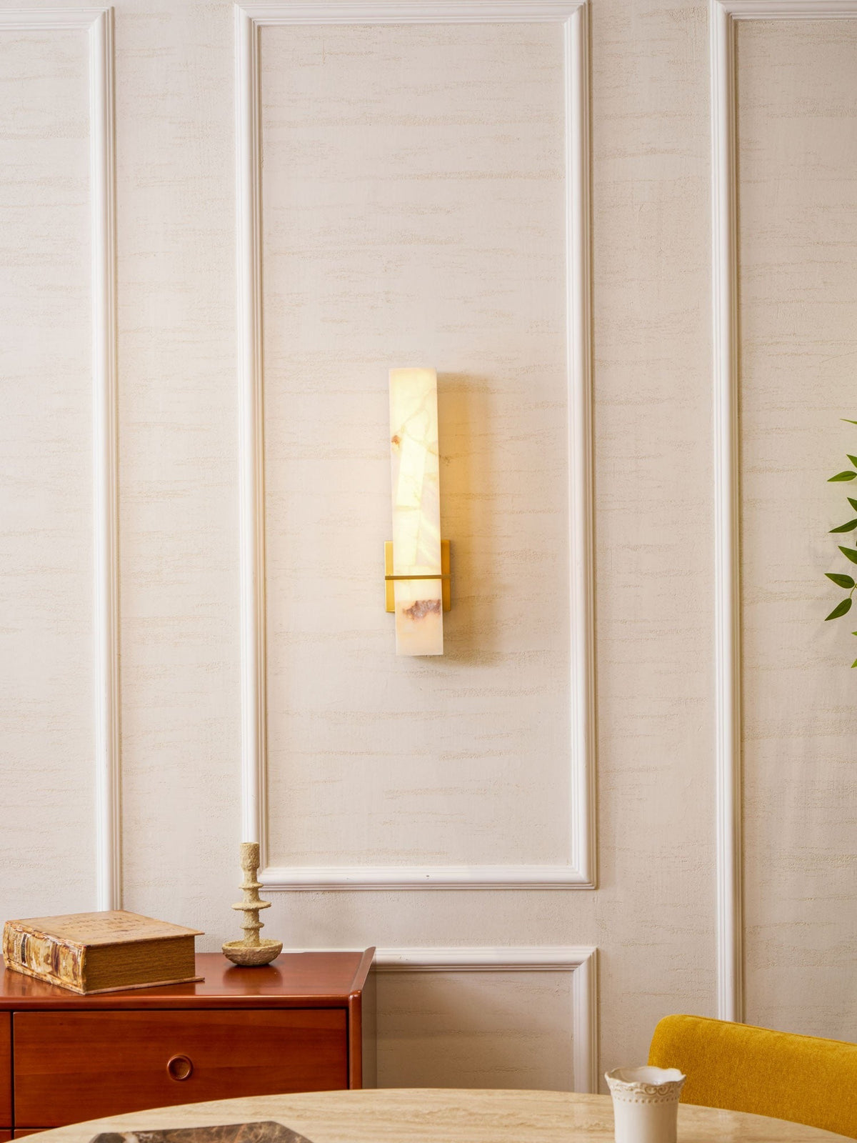 Sconce mounted beside mirror, bedroom vanity styling
