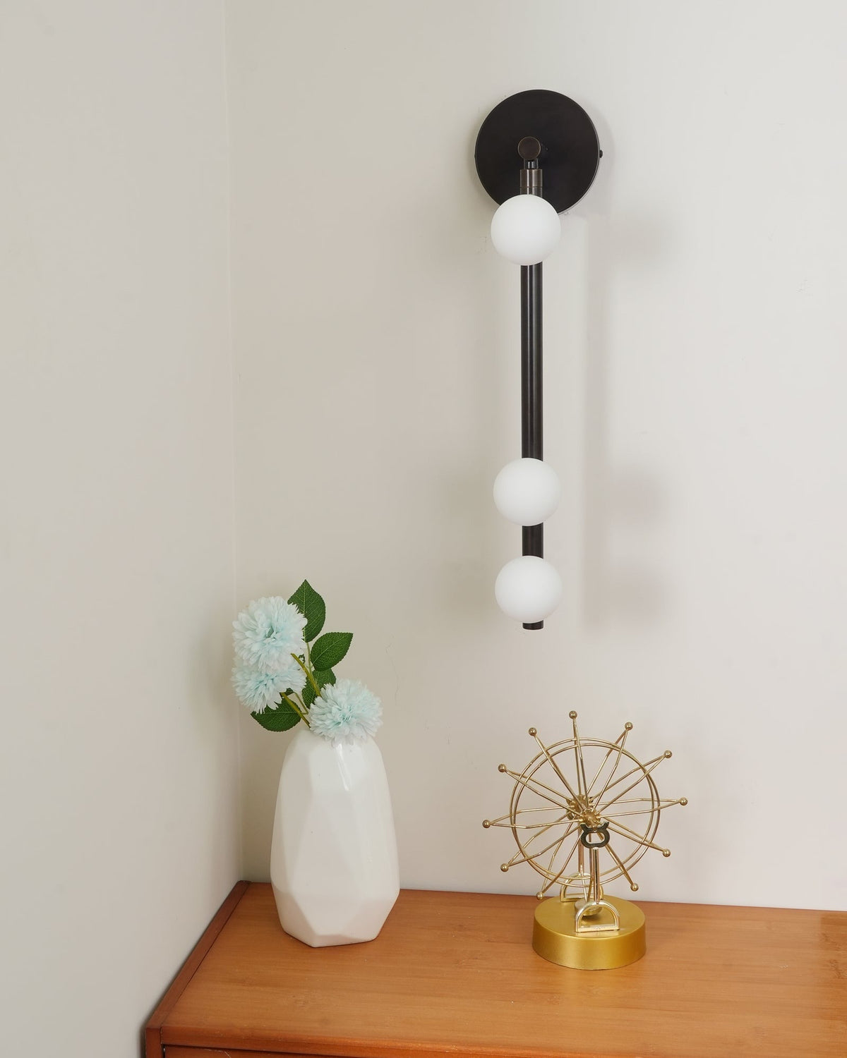 Seven-B sconce warm LED light through glass
