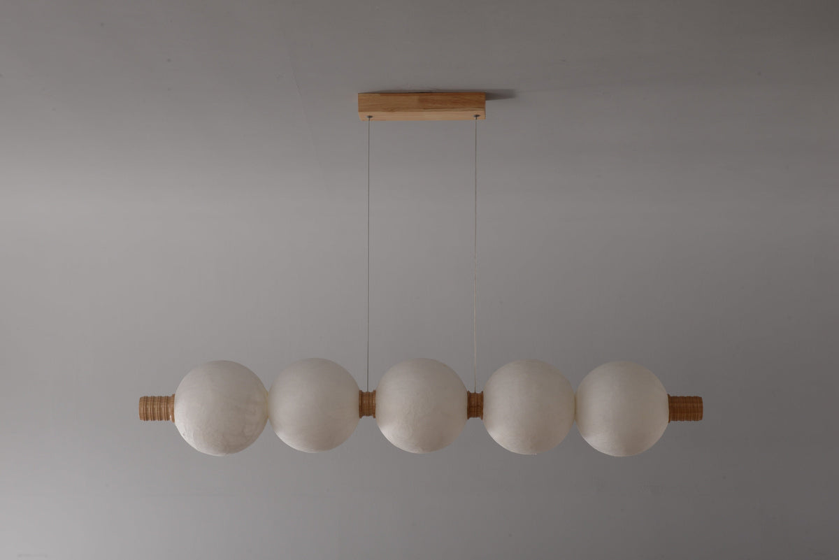 5-globe horizontal natural mulberry silk pendant with light wood details, real product photograph