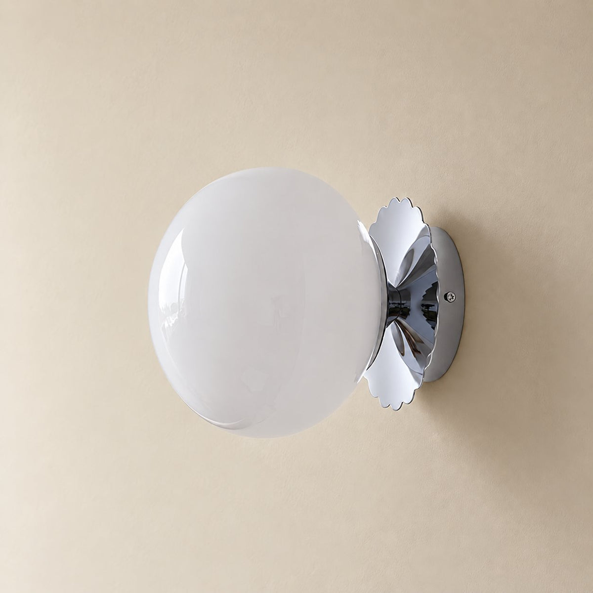 Tâmega convertible wall sconce in chrome and white, unlit on a plain plaster wall.