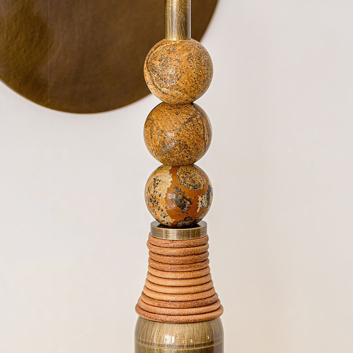 Torto marble and brass, dark studio background