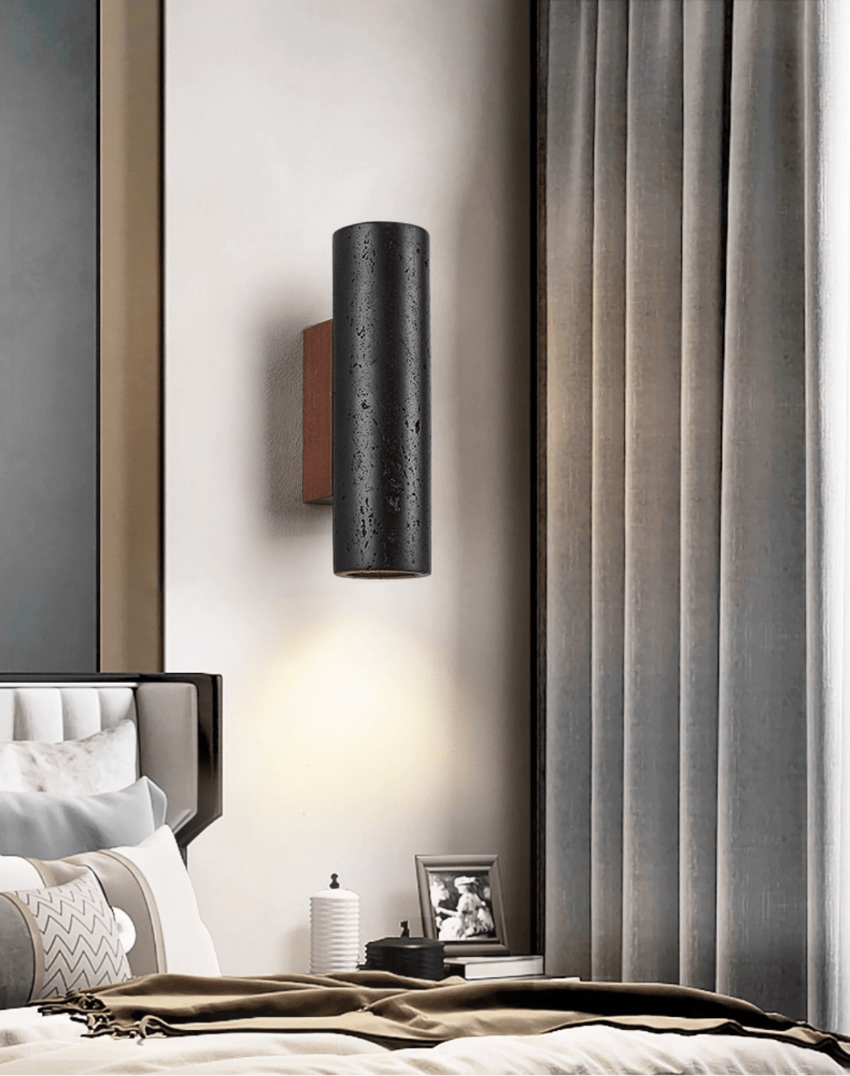 Travertine cylinder detail showing matte black finish and surface texture